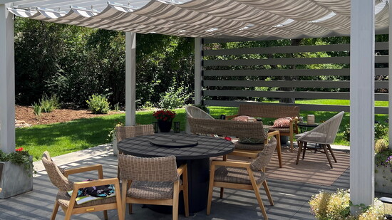 A tailored pergola cover transforms this patio into a true extension of the home, designed for comfort, longevity, and outdoor living.
