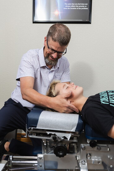 Young athlete, Deegan, working with Dr. Erik