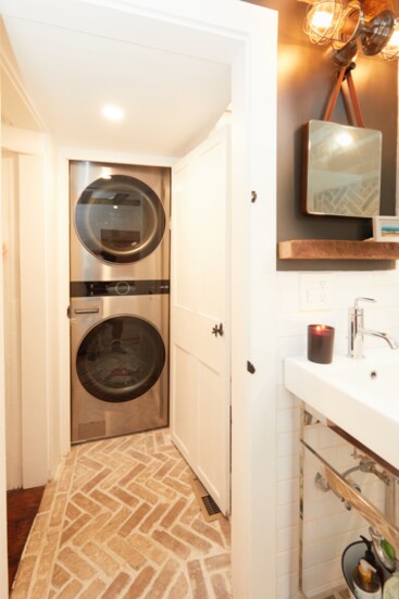 Washer/dryer tucked into a closet.