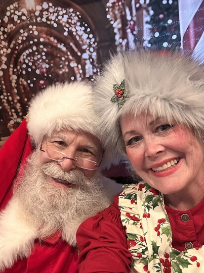 As ambassadors of merriment, Brian and Allison love spreading holiday joy as Santa and Mrs. Claus. Photo by Allison Dunning