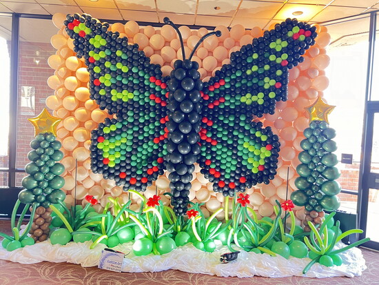 A vibrant showstopper, this oversized butterfly garden proves balloon art can be both whimsical and breathtaking. Photo by Allison Dunning
