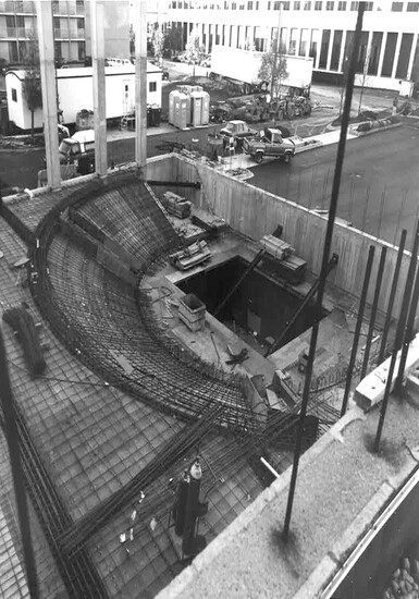 A parallel space takes shape, reflecting how multiple theaters were conceived together.