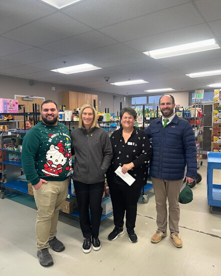 Sarah and David Klein dropping off a donation to the Harford Community Action Agency, Photo Credit: Shane Cromwell, Nevins & Associates