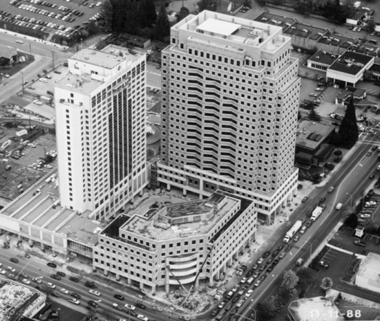 Aerial view of Bellevue Place under construction in the late 1980s