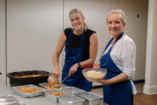 Cooks in the Kitchen (CIK) Volunteers from the Lacek Group, making meals for Hammer & NER homes