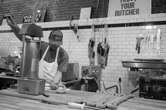 Sausage being made at Stock Provisions. Photo Credit: Jason Lappa