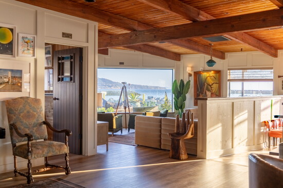 A cozy, home-like interior space where members can relax and connect.