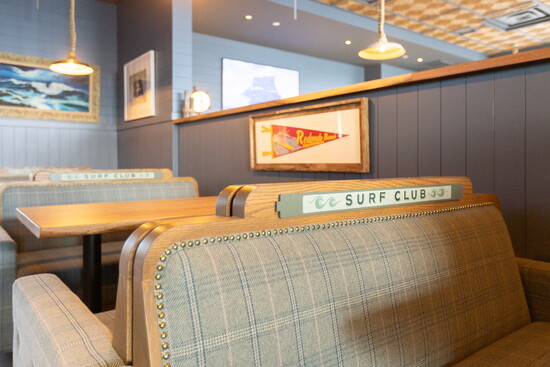 The relaxed, coastal-inspired interior of the restaurant open to the public.