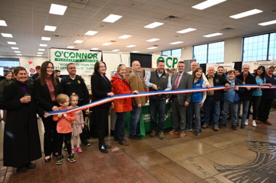 The Frederick County Chamber of Commerce leads the ribbon cutting ceremony to launch the Home & Garden Show.