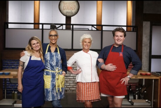 The two finalists for the red team, Cameron, and for the blue team, Amber Leverette, with the celebrity chef mentors, Anne Burrell and Carla Hall.