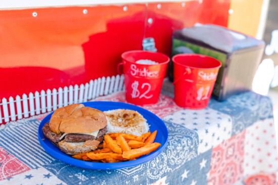 Doggie dining at its best with many healthy options including burgers, sweet potato fries and rice with beef gravy, veterinarian approved. 