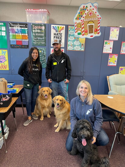 Dr. Dana Wyss, LMFT, an expressive arts therapist, and adjunct professor at LMU, with Charleen and Shawn at an elementary school event.