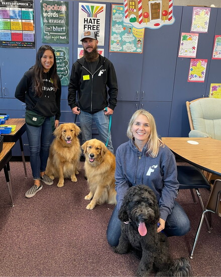Dr. Dana Wyss, LMFT, an expressive arts therapist, and adjunct professor at LMU, with Charleen and Shawn at an elementary school event.