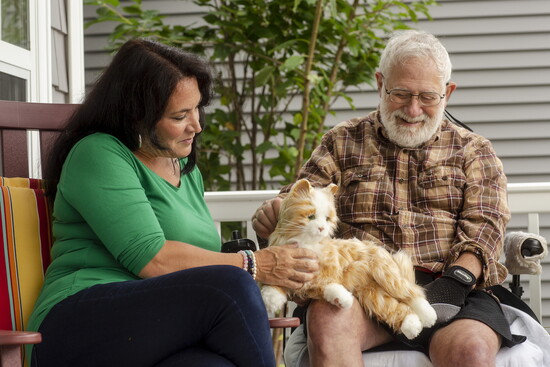 Patients show a marked change in demeanor when handed a robotic pet.