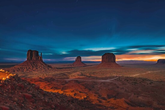 In the dark, Dr. Scott Kasden displayed his skill leaving the shutter open to shoot a stunning picture of the Mittens in Monument Valley. 