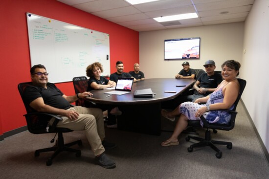 Hanging out at the monthly marketing and strategy meeting is Andy Chavez, Taya Ortiz, Devinn Chavez, Mario Flores, Sergio Garcia, Luis Flores, and Dina Chavez. 