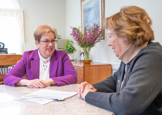 Bennett consults with a client. Photo by Jon Crean Photography