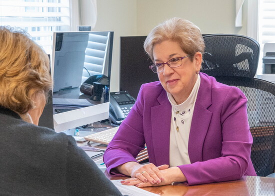 Bennett consults with a client. Photo by Jon Crean Photography
