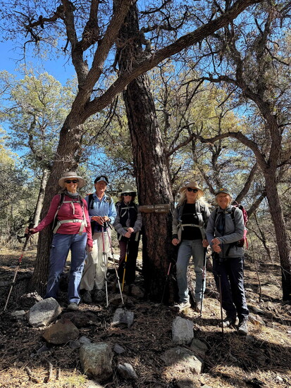 Members of the Aldo's Silver City Broadband in New Mexico gather in Gila National Forest