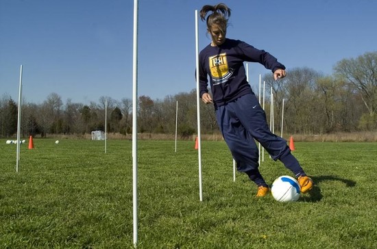 Carli practices her footwork while playing at Delran High School. 