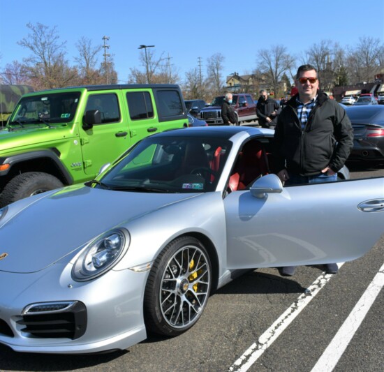 Newtown resident Josh Fishman with his Porsche 911 Turbo S