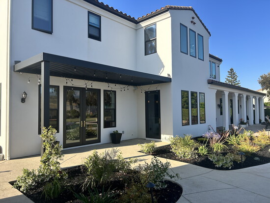 Incorporating new landscaping, lighting and grass transformed this space into a year-round retreat. 