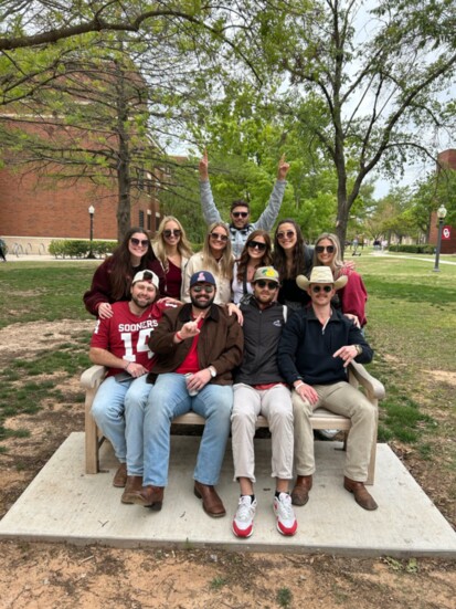 Braxton's friends gather at a memorial bench dedicated to him that's located outside the OU architecture college.