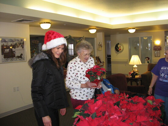 Carrie Maul with a resident of a local nursing home - a joyful time.