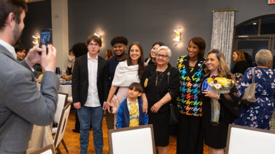Awardees Angling for a Photo with Chair Randall