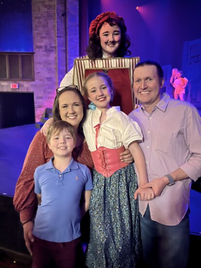 Dr. Clowers poses with his family following a Sooner Theatre production. (Photo by Leslie Clowers)
