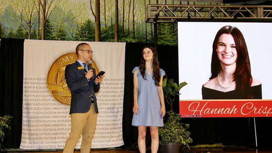 Hannah Crisp, recognized by Dr. Kevin Bracher, Whitefield Academy Head of School.