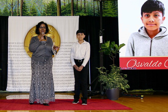 Osvaldo Cortez, 5th Grader at Russell Elementary is recognized by Principal Dr. Tammy Watson