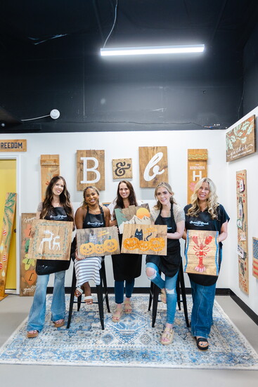 The Aiken Medical Aesthetics team show off their finished products.