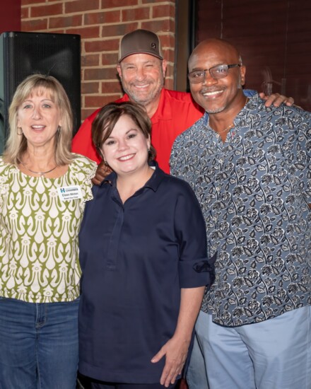 Eileen Minton, Kathleen Hawkins, Craig Sinnard and Lynn Bowles pose during the Hendersonville Lifestyle eighth anniversary celebration.