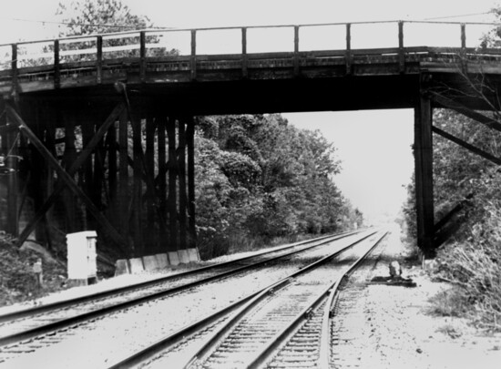 The overpass and railroad tracks