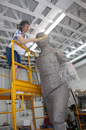 Julia Knight works on her current project, a statue of Rosa Parks.