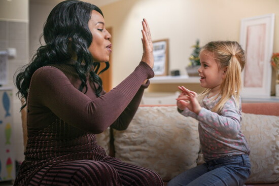 CASA advocate with child. Photo Credit: CASA (National).