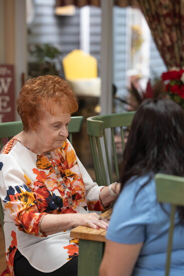 Caregiver with client. Photo Credit: Kerry Dietz