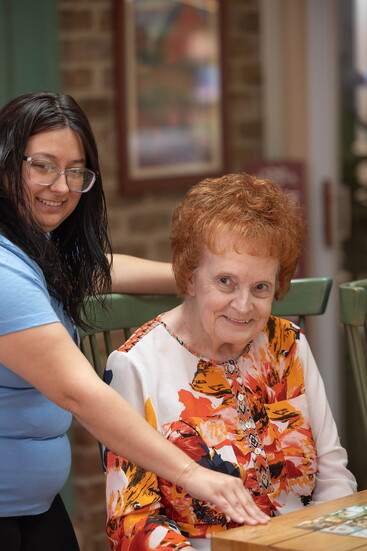 Caregiver with client. Photo Credit: Kerry Dietz