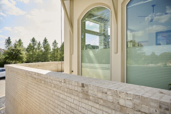 The view from outside with the blinds partially raised from the floor.