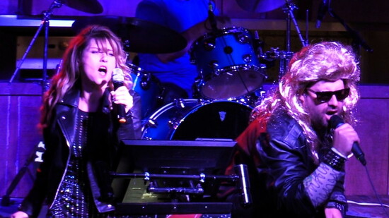 Dawn Megli and Kyle Jorrey singing Bon Jovi for James Storehouse at the first Charity Karaoke in 2018