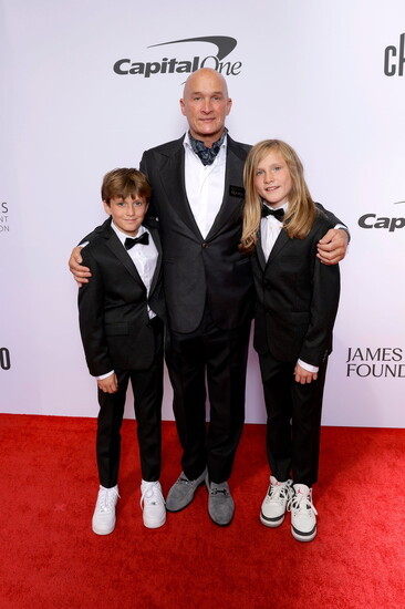 Chef Brian Lewis, center, with his twin boys Jax and Jude at the 2025 James Beard Awards. 