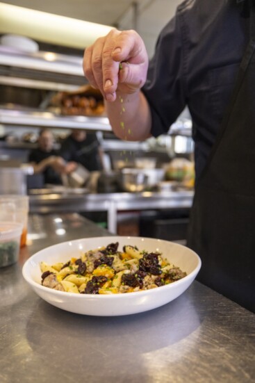 A sprinkle of local cheddar cheese finishes the pasta dish.