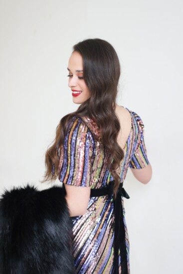 Multi color art deco sequin dress with back V and velvet back bow from Just Me.  Faux fur wrap by Bella Chic.