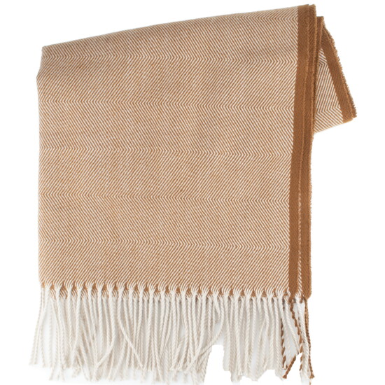 Timeless accent for layering, herringbone fringe scarf blends soft texture with understated pattern. Warm tan and classic detailing for a finishing touch ($65).