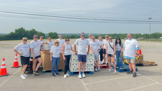 Staff from Kings Local School District assist Shared Harvest with a food distribution during the 2025 Community Care Day.