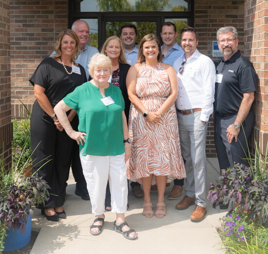 United Way of Warren County board members at the ribbon cutting ceremony for their new location, celebrating 55 years of serving the community.