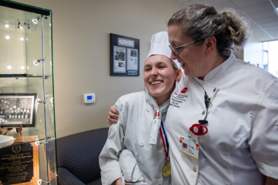 Chef Paula Recinella (right) congratulates Award-Winning CIM Student Ashly Winkleman on her award