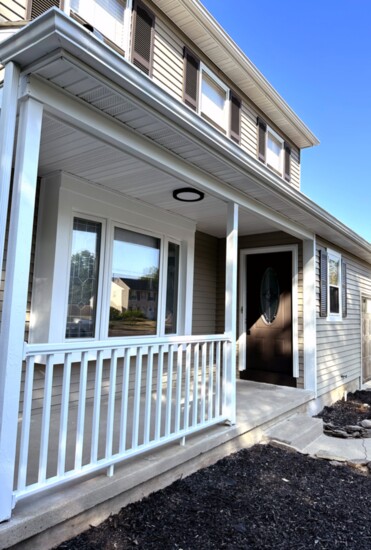 Painted entire exterior: aluminum siding, porch, doors, shutters, garage, doors, and gutters