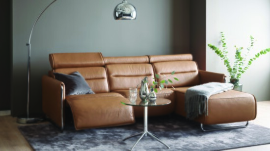 Recliner Sofas offer not only built-in seats but some include lay-flat options that expand to queen-size beds. (Shown: Ekornes Stressless® “Emily” sofa).